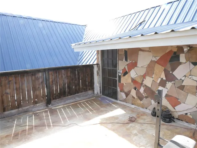 an outdoor view with wooden fence