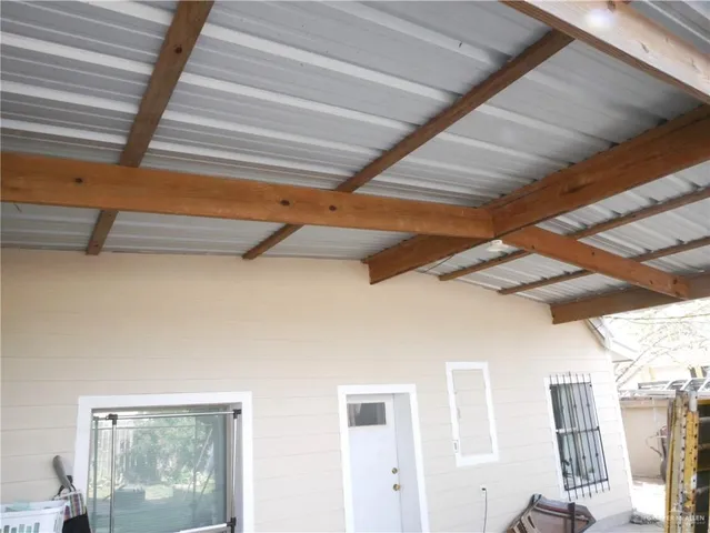 a view of a back yard of the house