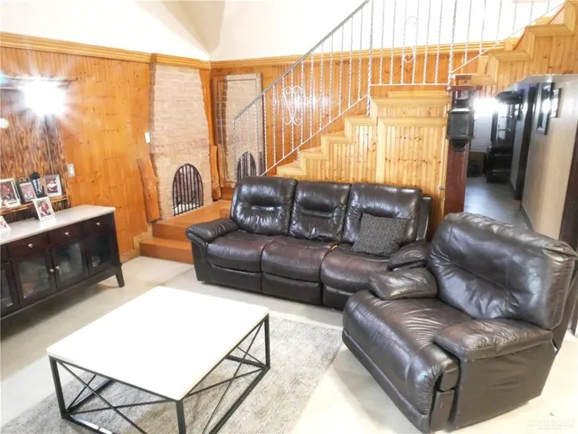 a view of a balcony with furniture