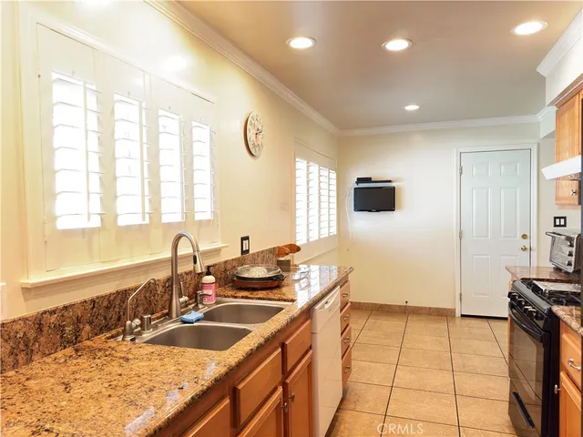 a bathroom with a sink double vanity and a mirror