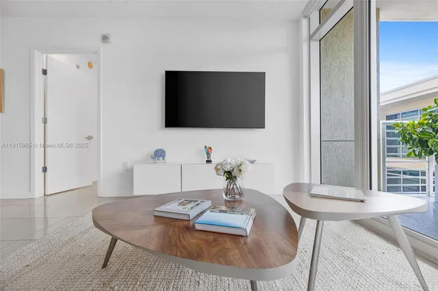 a kitchen with stainless steel appliances a sink a stove and a refrigerator