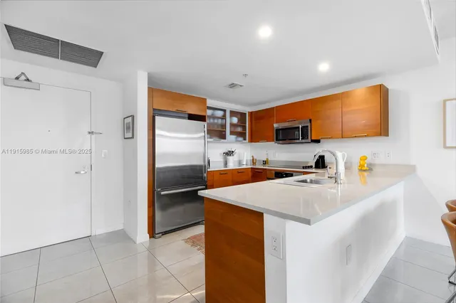 a kitchen with a sink and a window