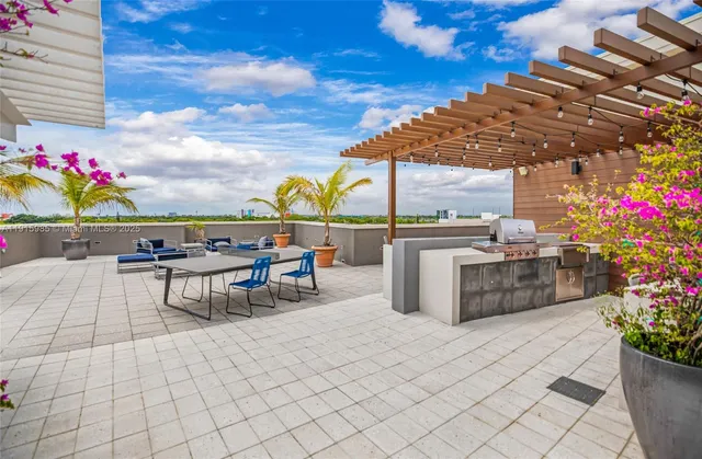a view of an house with backyard space and garden