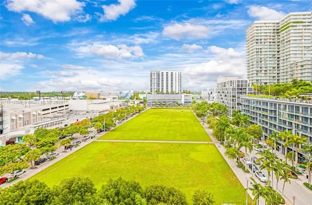 a view of a street with shops