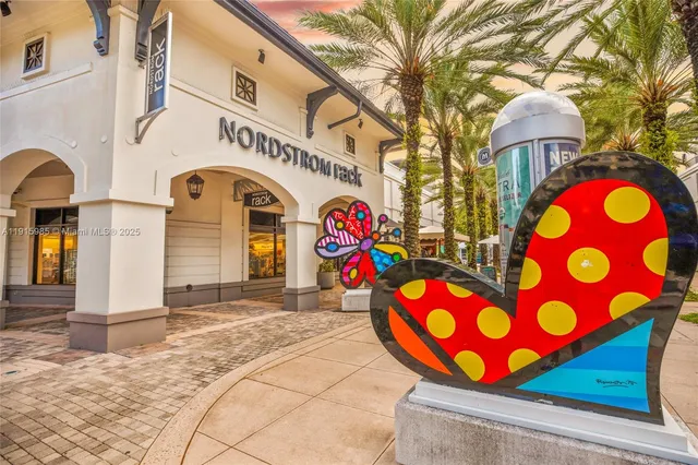 a outdoor space with lots of tables and chairs