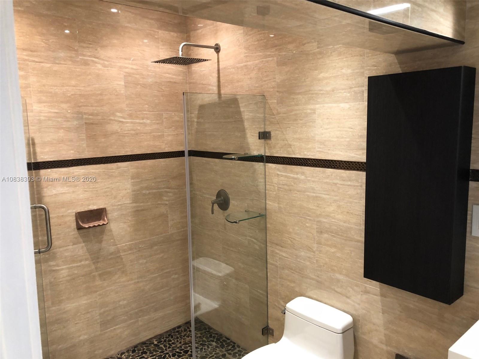 1220 West 62nd Street Hialeah, FL 33012 - Photo 14 of 53 a bathroom with a shower