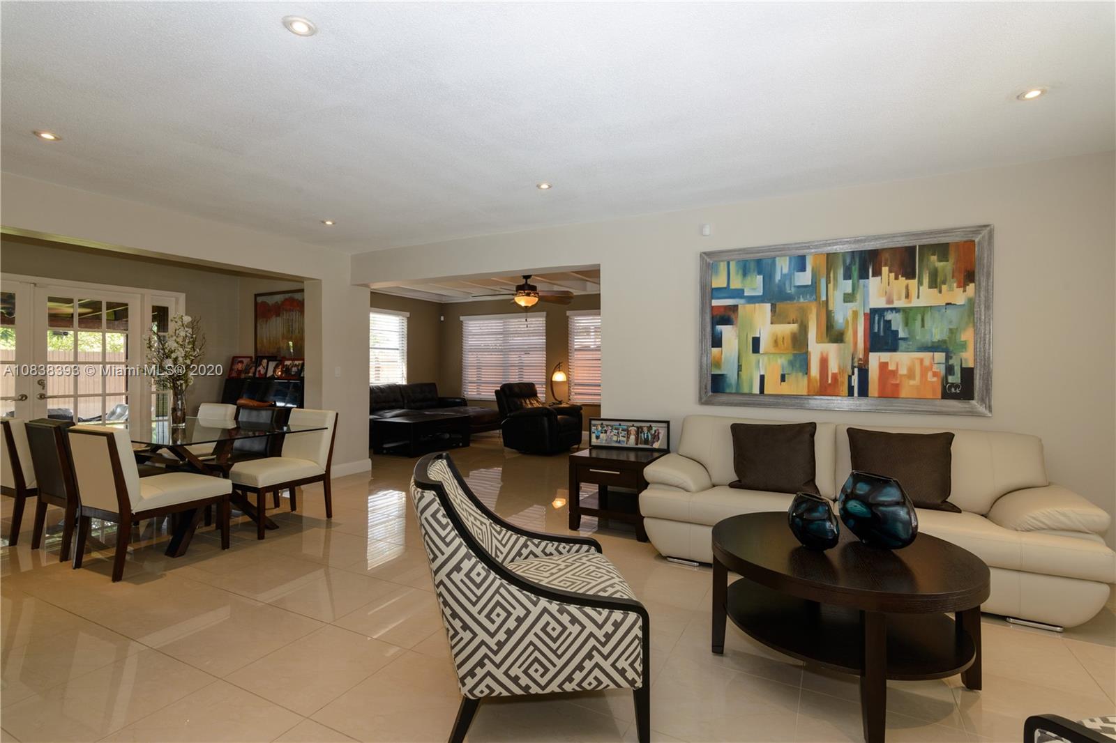 1220 West 62nd Street Hialeah, FL 33012 - Photo 31 of 53 a living room with furniture and a window