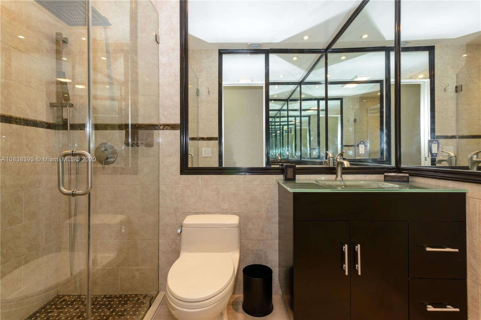 1220 West 62nd Street Hialeah, FL 33012 - Photo 37 of 53 a bathroom with a sink a toilet and shower
