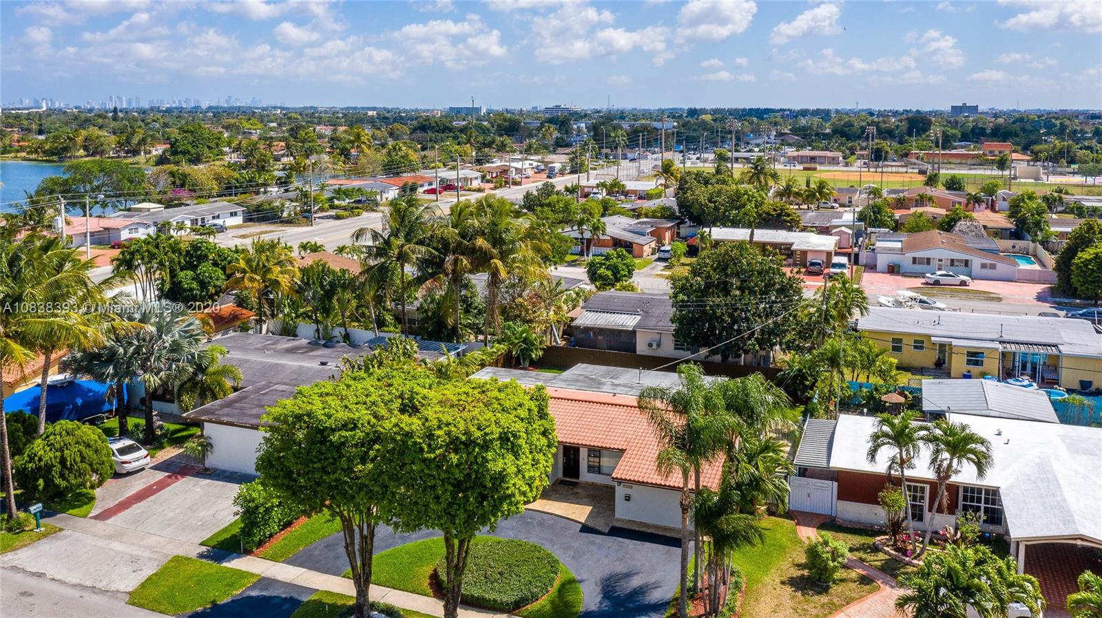 1220 West 62nd Street Hialeah, FL 33012 - Photo 4 of 53 a view of a city with lawn chairs and large trees