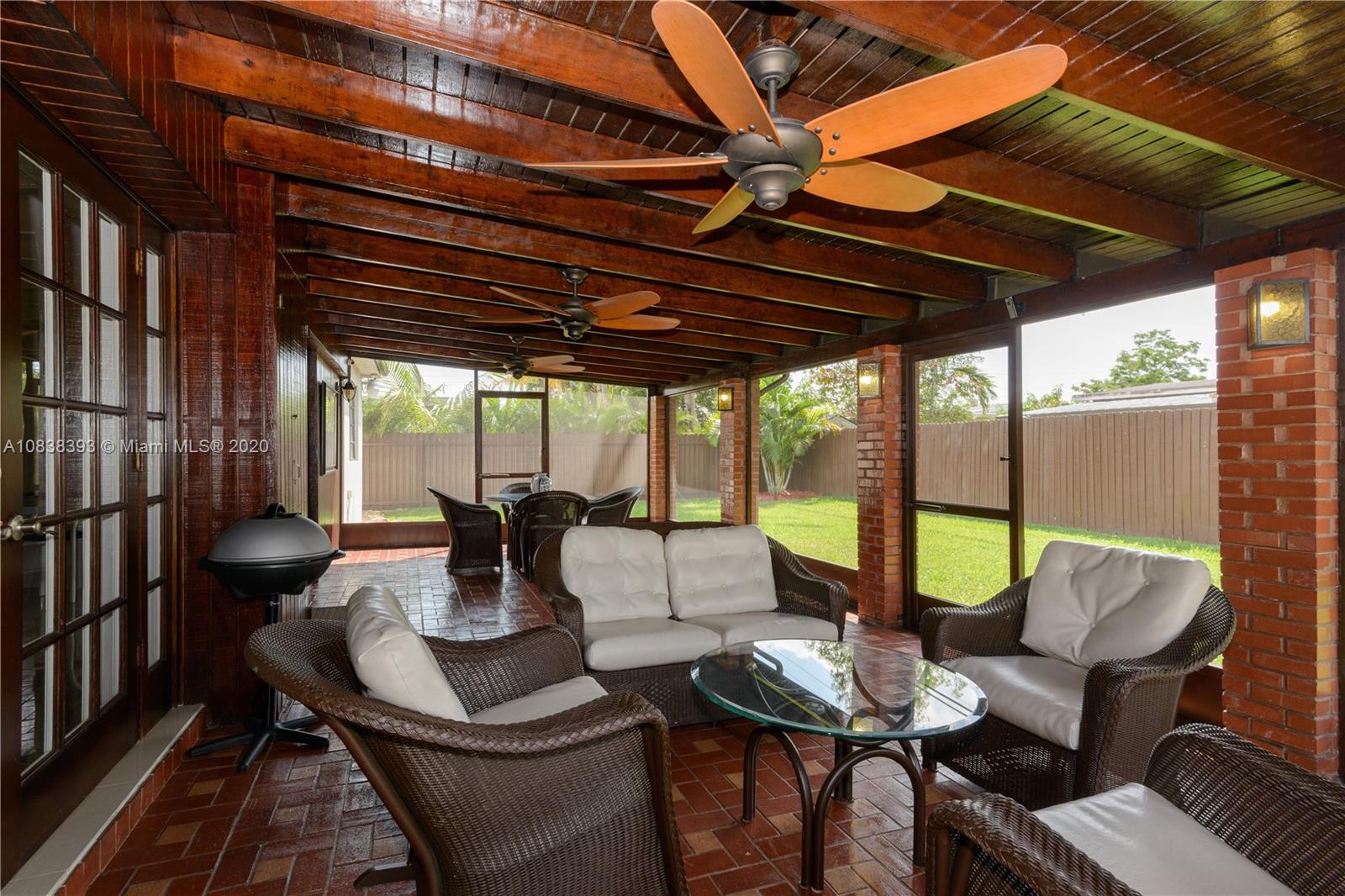 1220 West 62nd Street Hialeah, FL 33012 - Photo 41 of 53 a dining room with furniture and wooden floor