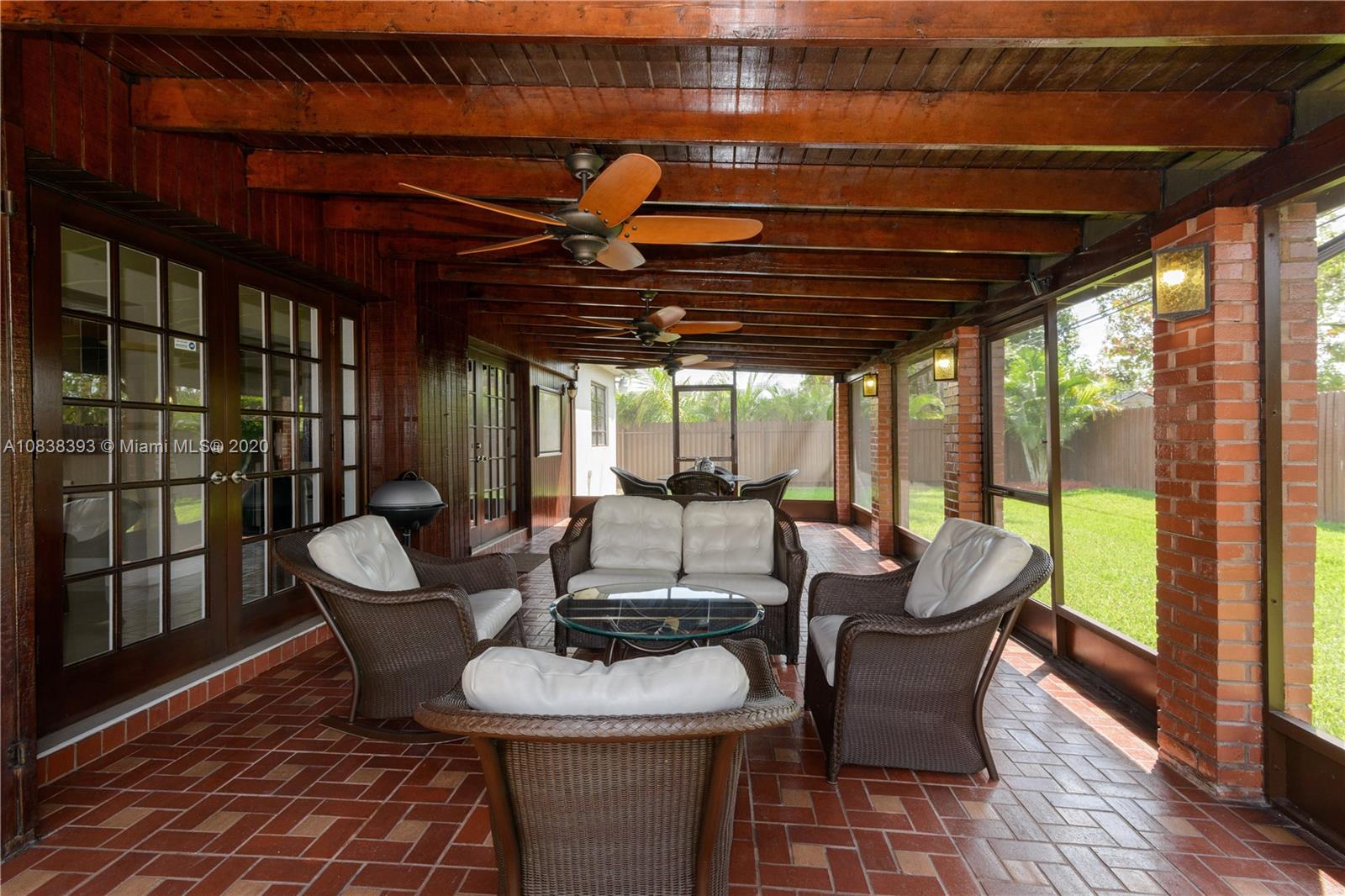 1220 West 62nd Street Hialeah, FL 33012 - Photo 42 of 53 a dining room with furniture and wooden floor