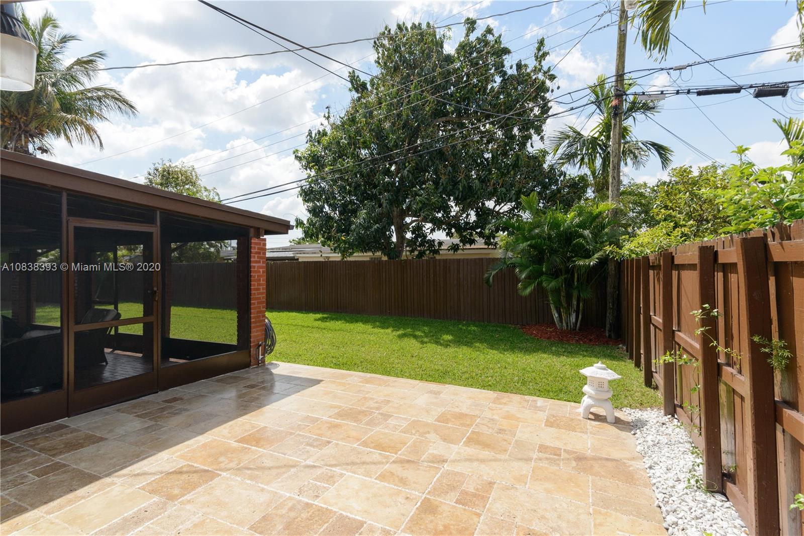 1220 West 62nd Street Hialeah, FL 33012 - Photo 44 of 53 a view of a backyard with a garden