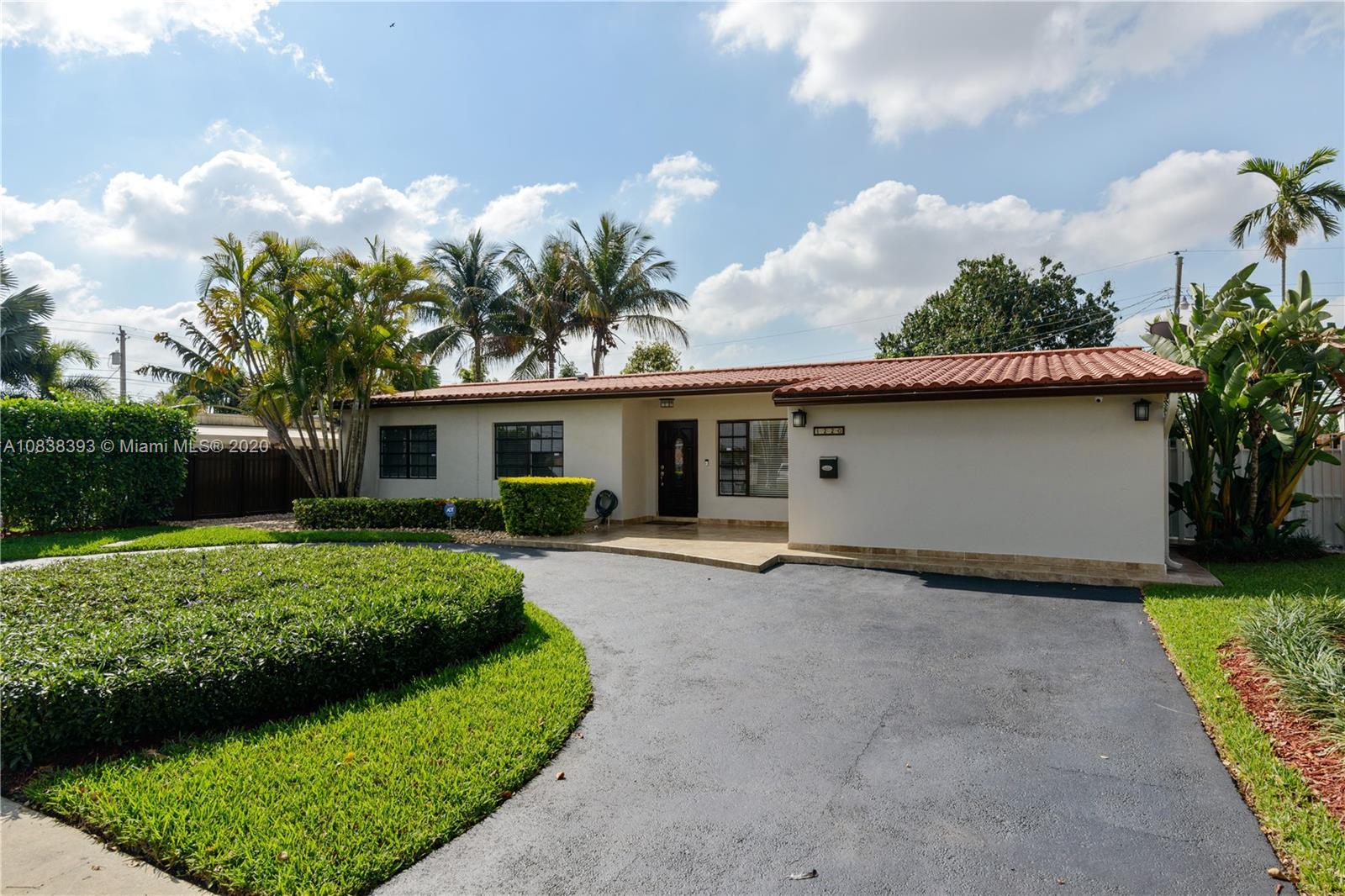 1220 West 62nd Street Hialeah, FL 33012 - Photo 53 of 53 a view of a house with a garden