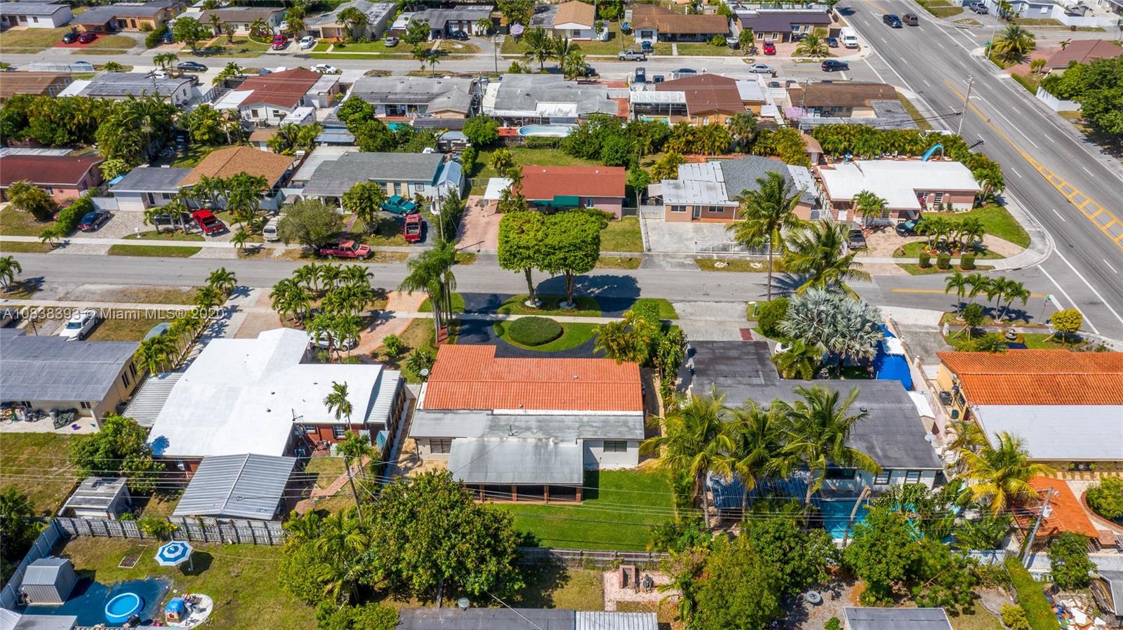 1220 West 62nd Street Hialeah, FL 33012 - Photo 8 of 53 an aerial view of residential houses with outdoor space