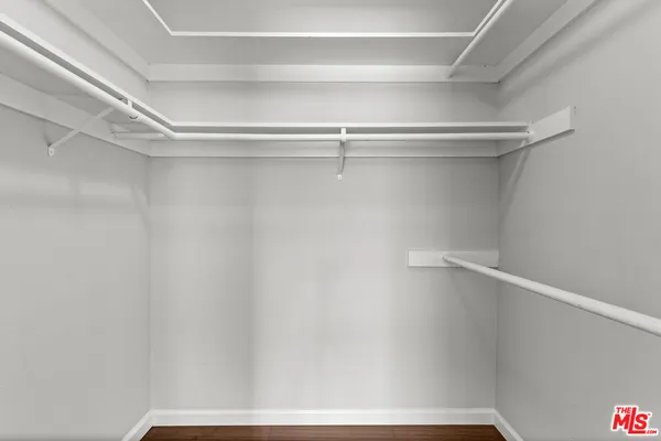 a view of an empty walk in closet