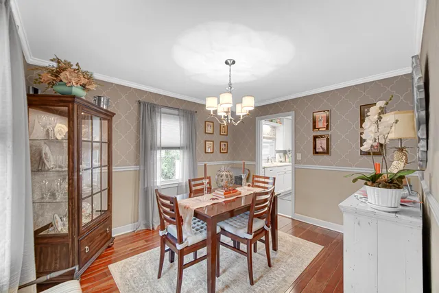 a living room with furniture fireplace and a flat screen tv