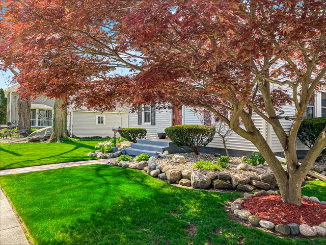 a garden view with a seating space