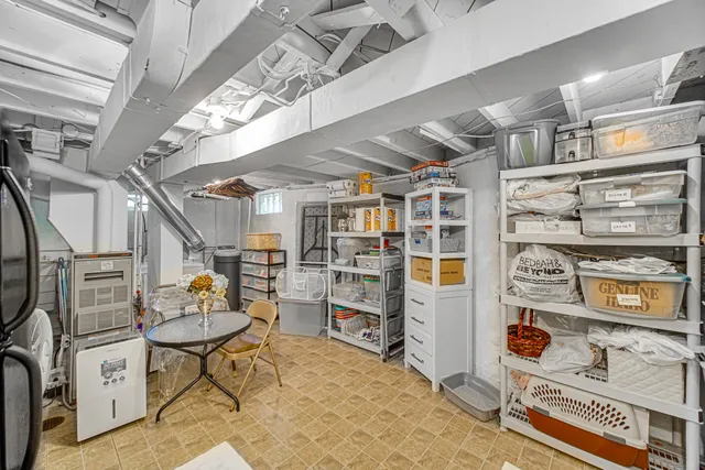 a kitchen with stainless steel appliances a refrigerator and a stove