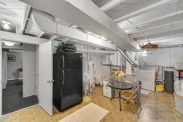 a utility room with a sink a washer and dryer