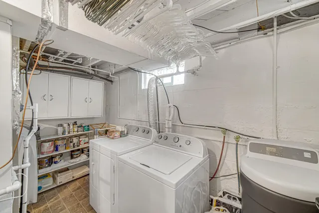 a view of a house with a yard and plants