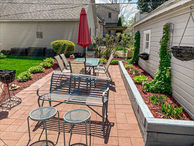a view of a chairs and tables in the patio