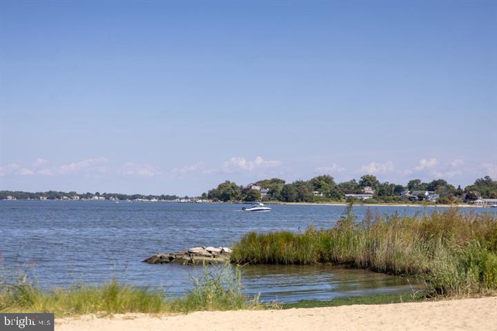 3714 3rd Avenue Edgewater, MD 21037 - Photo 5 of 7 Serene waterfront with gentle waves.