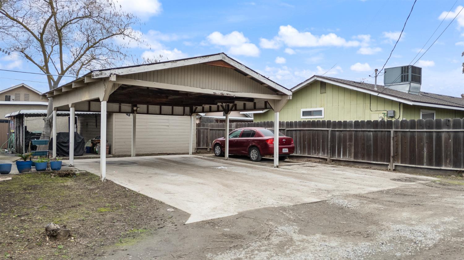 150 North Acacia Avenue Ripon, CA 95366 - Photo 14 of 54 a view of a house with a patio