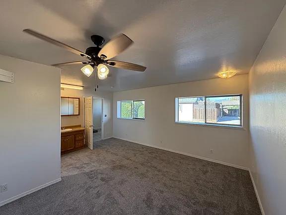 150 North Acacia Avenue Ripon, CA 95366 - Photo 21 of 54 a view of an empty room with a window