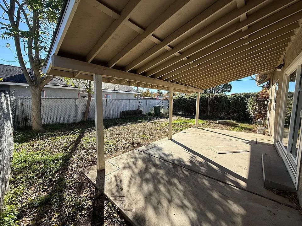 150 North Acacia Avenue Ripon, CA 95366 - Photo 34 of 54 a view of a backyard
