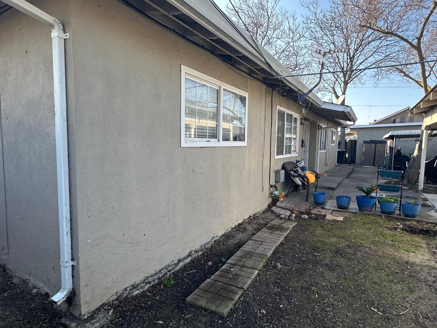 150 North Acacia Avenue Ripon, CA 95366 - Photo 37 of 54 a view of a backyard with sitting area