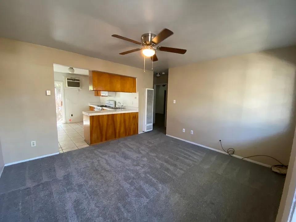 150 North Acacia Avenue Ripon, CA 95366 - Photo 53 of 54 a view of a kitchen with a sink and a window