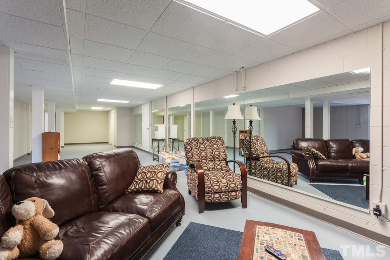 4605 Cheek Road Durham, NC 27704 - Photo 22 of 28 a living room with furniture