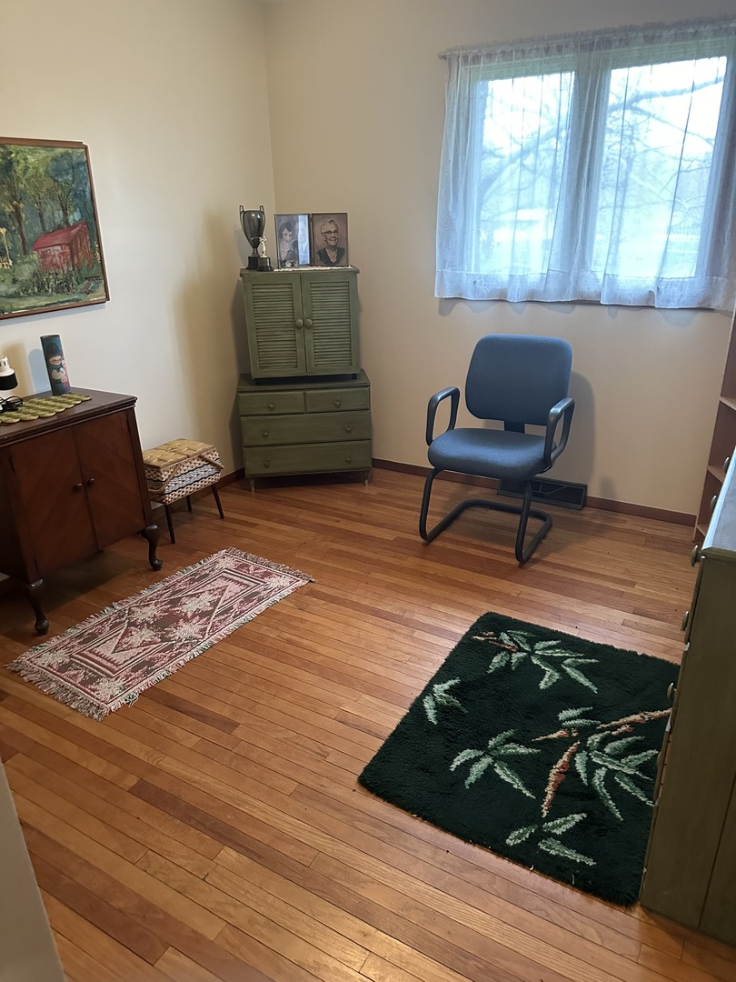 15258 Mountain View Heyworth, IL 61745 - Photo 15 of 27 a living room with a couch and a window