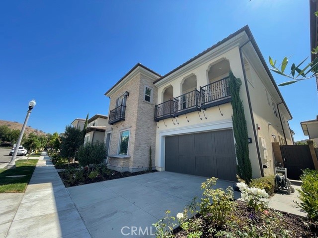 60 Gainsboro Irvine, CA 92620 - Photo 1 of 1 a front view of a house with garden