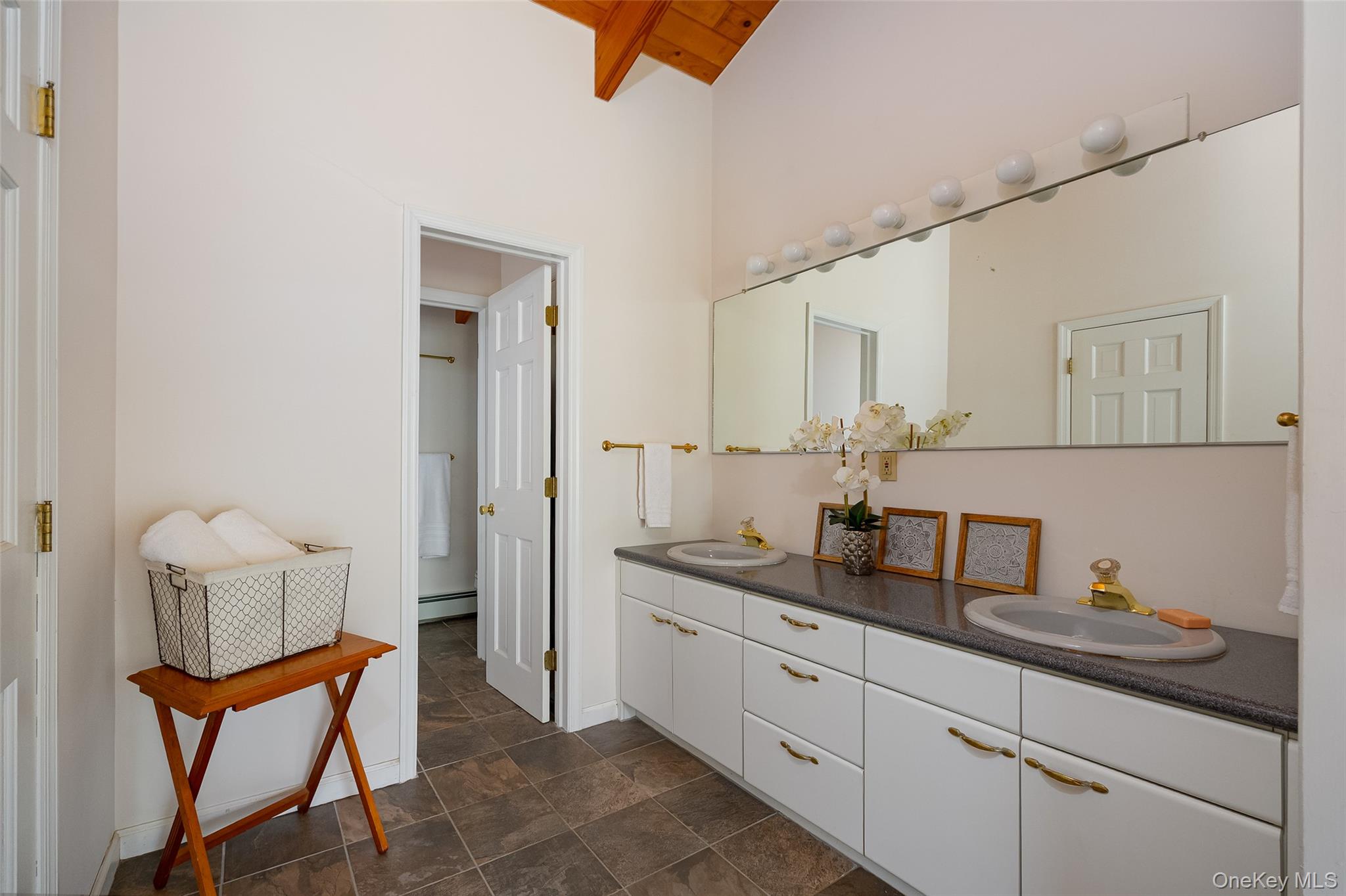 33 Willow Brook Ridge Clinton Corners, NY 12514 - Photo 34 of 50 a spacious bathroom with a granite countertop sink and a mirror