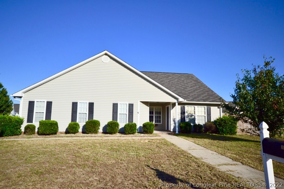 2330 Chasewater Road Fayetteville, NC 28306 - Photo 1 of 44 a view of a house with backyard and garden