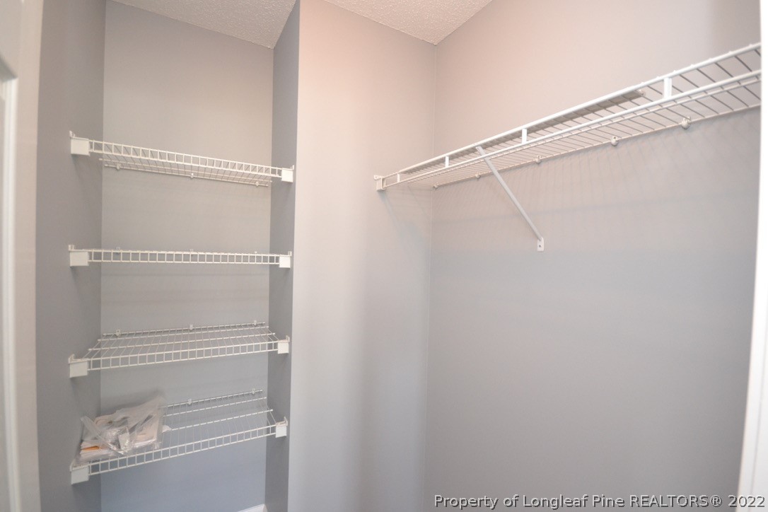 2330 Chasewater Road Fayetteville, NC 28306 - Photo 13 of 44 a view of walk in closet