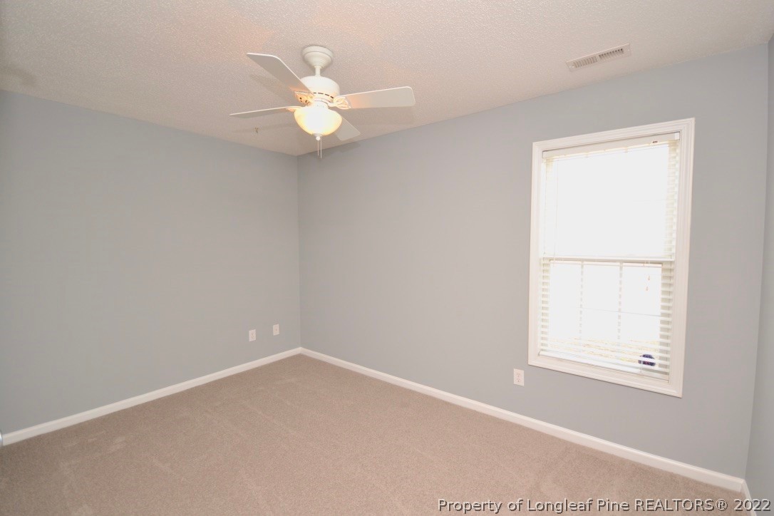 2330 Chasewater Road Fayetteville, NC 28306 - Photo 17 of 44 an empty room with a window