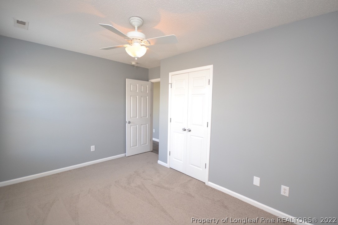 2330 Chasewater Road Fayetteville, NC 28306 - Photo 18 of 44 a view of an empty room with a window