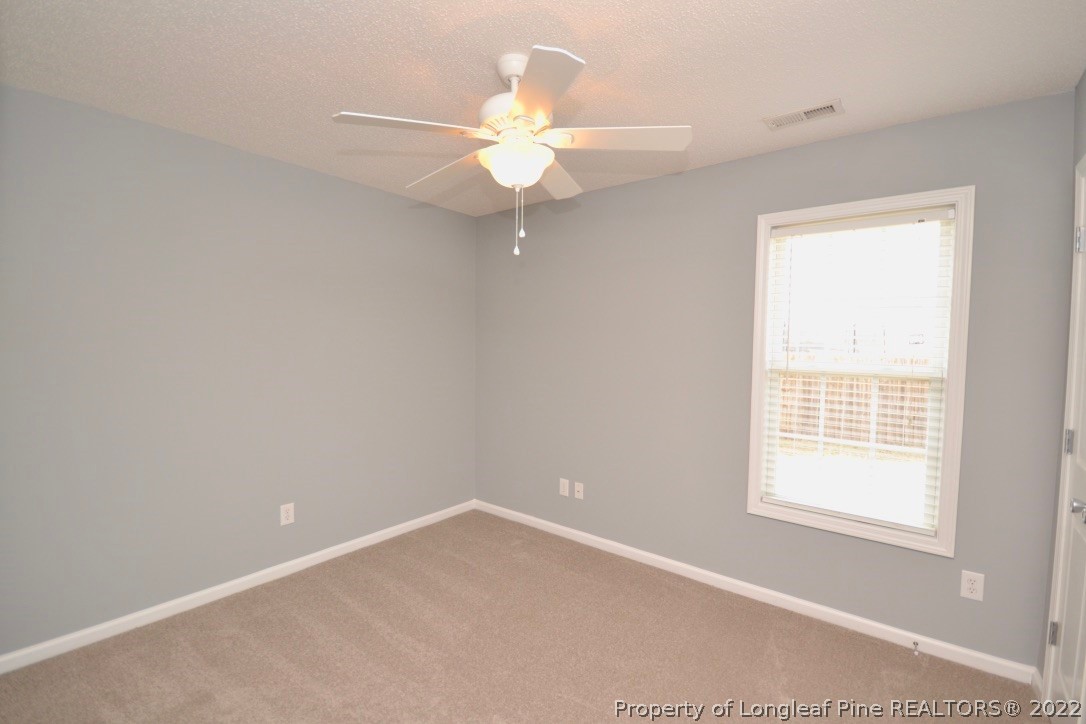 2330 Chasewater Road Fayetteville, NC 28306 - Photo 20 of 44 a view of an empty room with a window