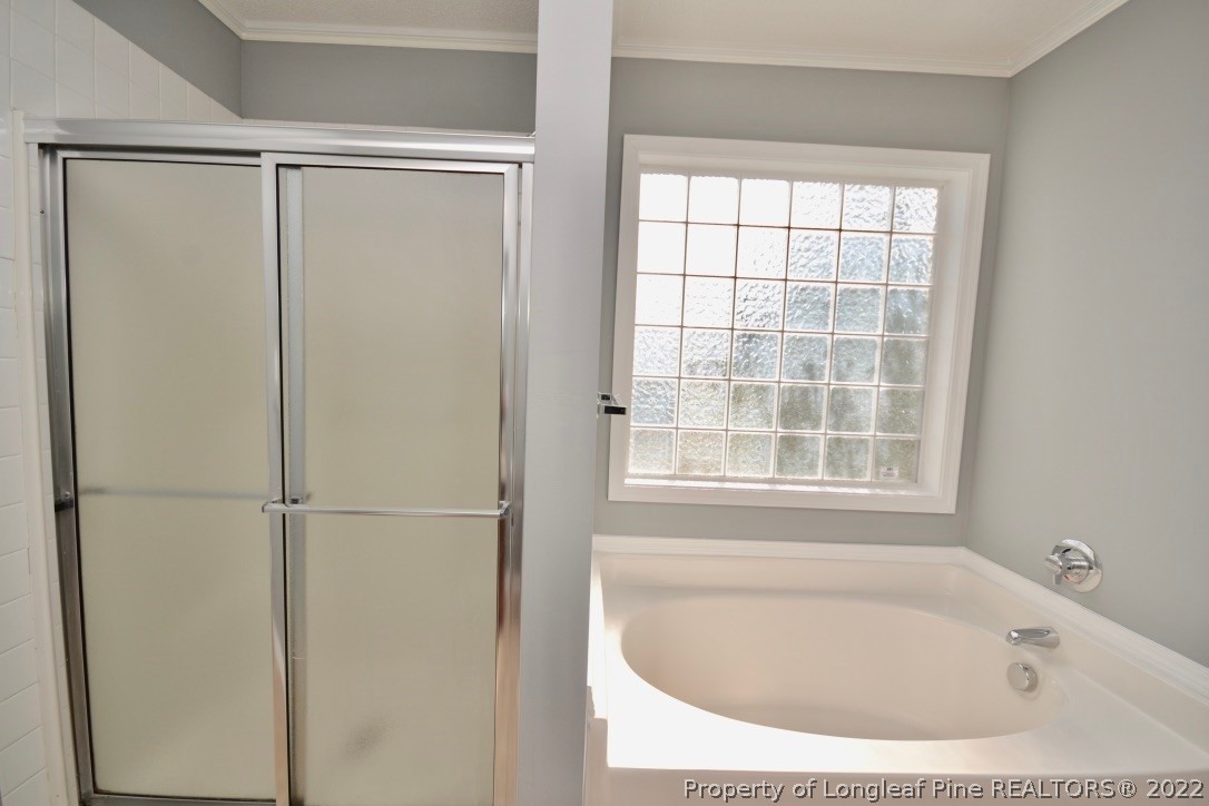 2330 Chasewater Road Fayetteville, NC 28306 - Photo 30 of 44 a bathroom with a tub