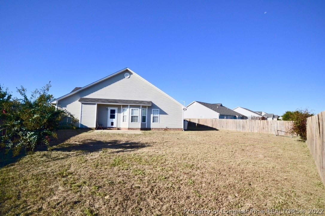 2330 Chasewater Road Fayetteville, NC 28306 - Photo 42 of 44 a front view of a house with a yard