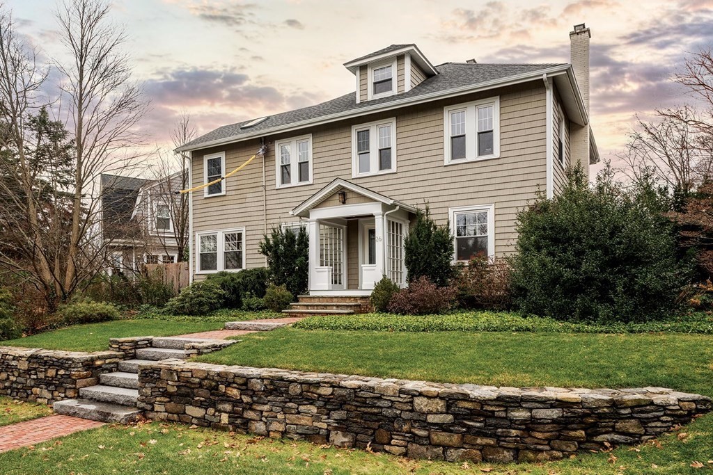 26 Islington Road Newton, MA 02466 - Photo 1 of 18 a front view of a house with a yard and garage
