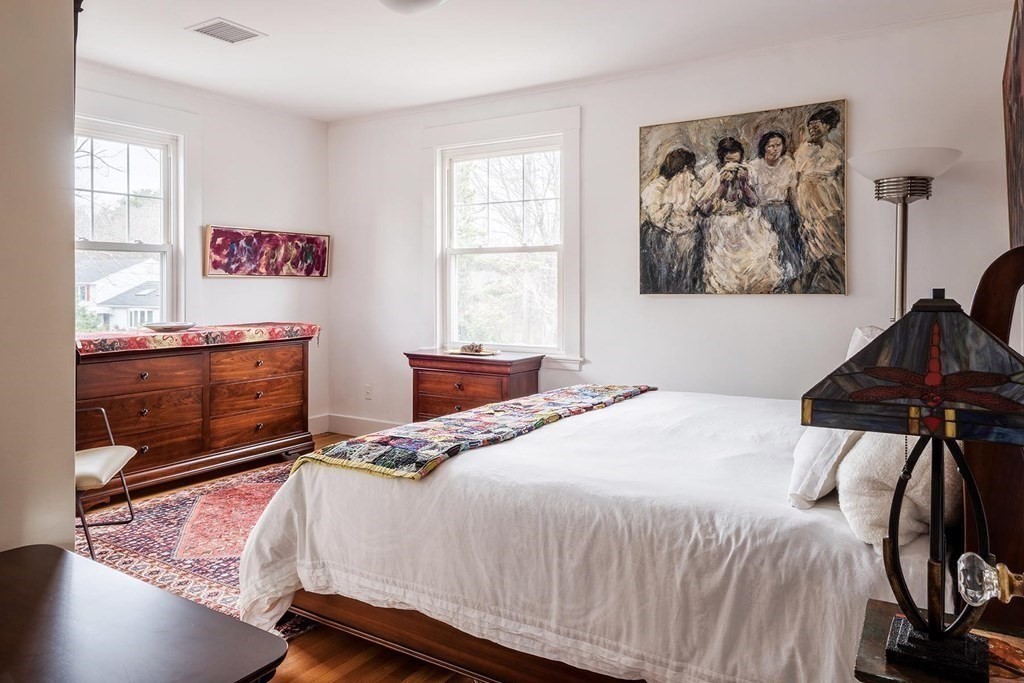 26 Islington Road Newton, MA 02466 - Photo 11 of 18 a bedroom with a bed and a painting on the wall