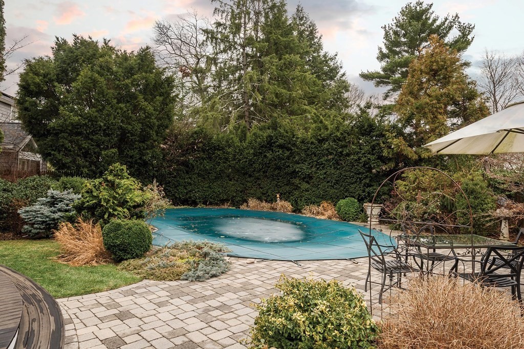26 Islington Road Newton, MA 02466 - Photo 15 of 18 a view of a backyard with sitting area