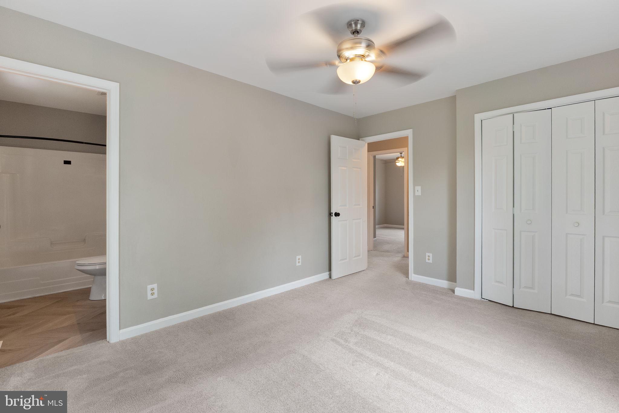 1527 Lincoln Road Shady Side, MD 20764 - Photo 16 of 30 wooden floor in an empty room and a bathroom