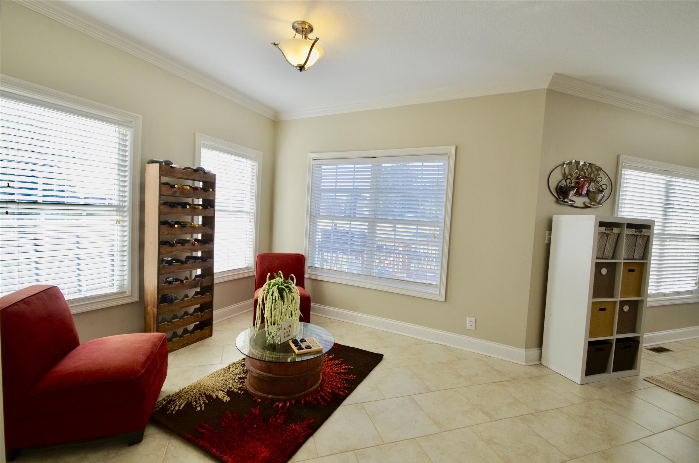 710 Dixie Bee Road Clarksville, TN 37043 - Photo 15 of 30 a living room with furniture a flat screen tv and a window