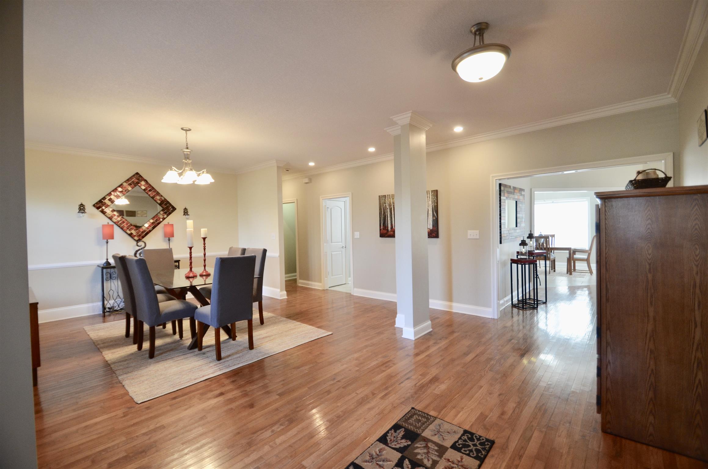 710 Dixie Bee Road Clarksville, TN 37043 - Photo 4 of 30 a view of a dining room with furniture and wooden floor