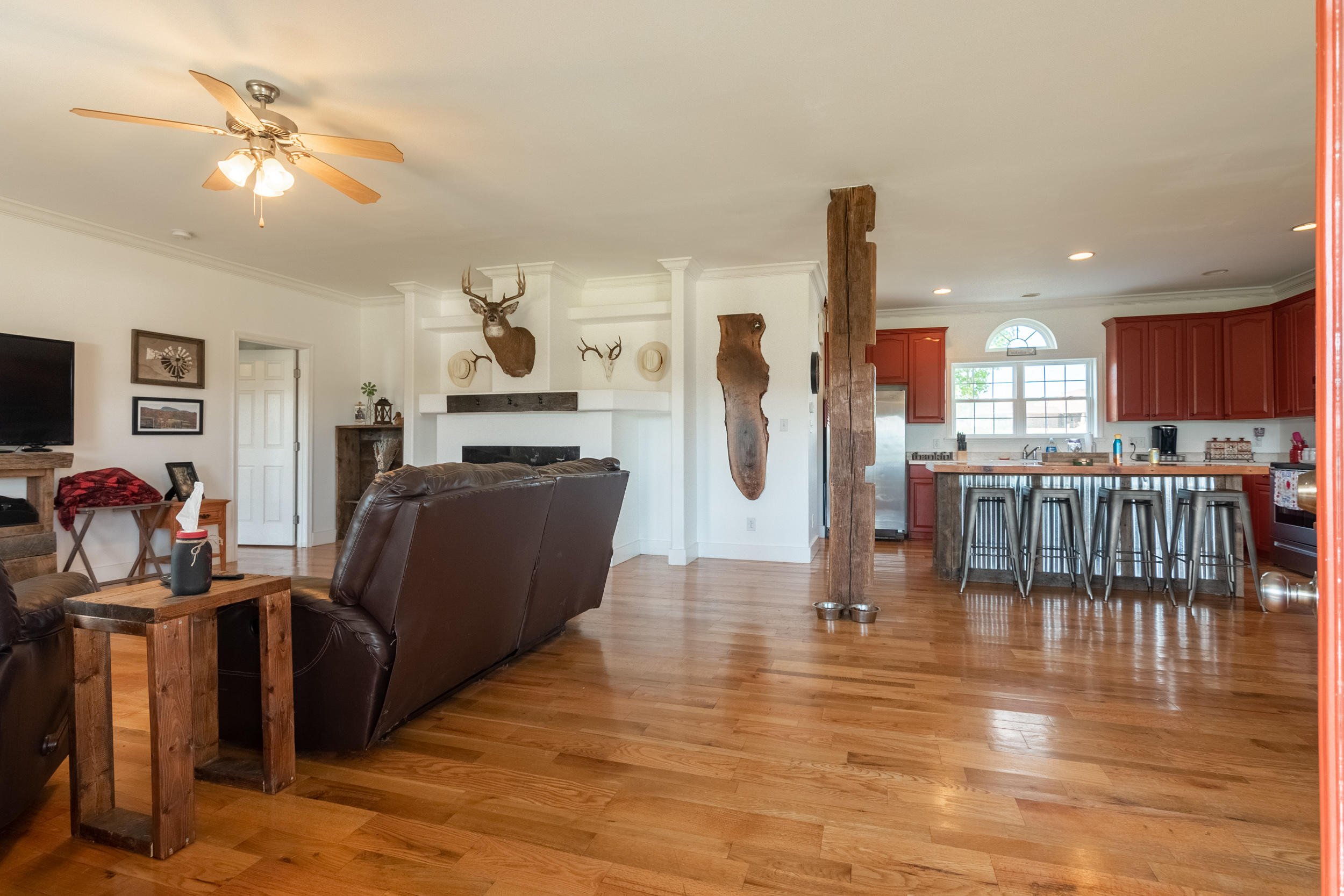 3850 Hopper Lane Riner, VA 24149 - Photo 19 of 50 a living room with fireplace furniture and a wooden floor