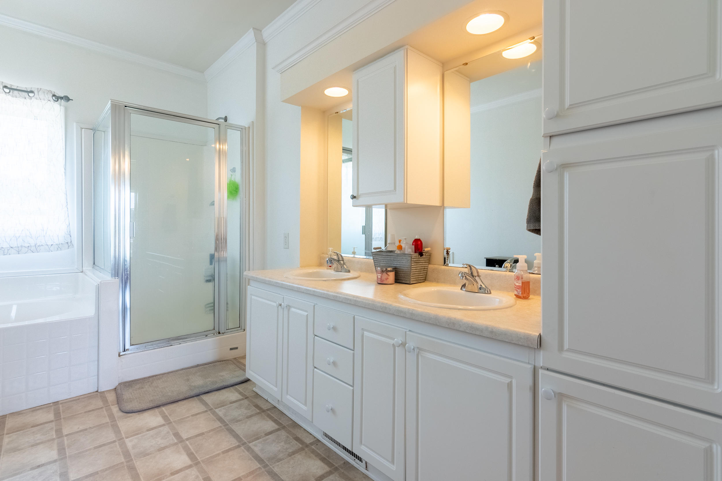 3850 Hopper Lane Riner, VA 24149 - Photo 25 of 50 a bathroom with a shower sink and mirror